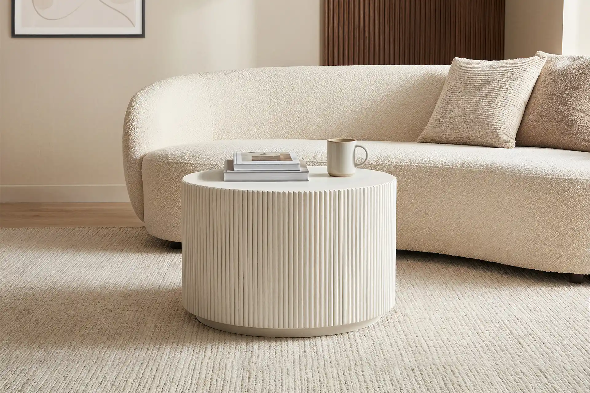 Indoors: the same material language carrying a living or contract space, inside to outside without a seam.